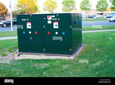 green box for electricity|green electrical box in street.